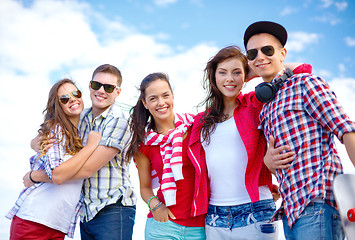 Image showing group of smiling teenagers hanging out