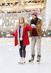 Image showing happy couple on skating rink