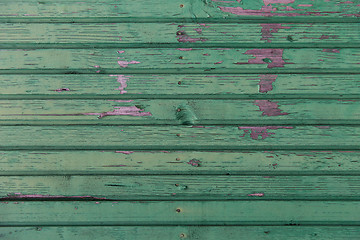 Image showing old wooden boards painted in green background