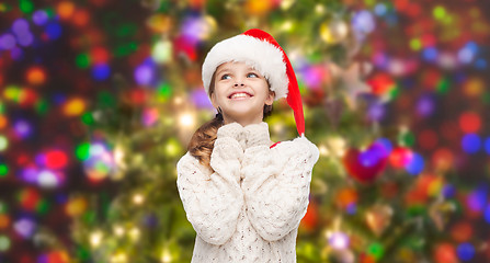 Image showing dreaming girl in santa helper hat