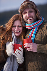 Image showing couple drink warm tea at winter