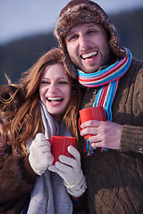 Image showing couple drink warm tea at winter