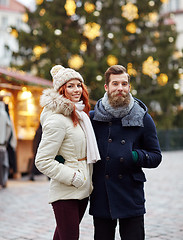 Image showing happy couple walking in old town