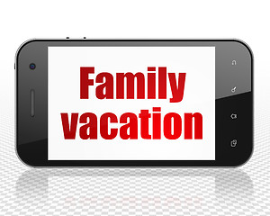 Image showing Tourism concept: Smartphone with Family Vacation on display