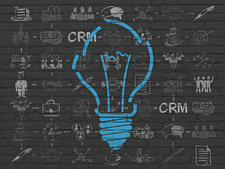 Image showing Business concept: Light Bulb on wall background