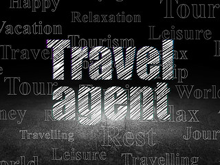 Image showing Vacation concept: Travel Agent in grunge dark room