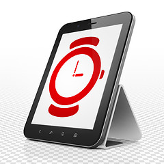 Image showing Time concept: Tablet Computer with Hand Watch on display