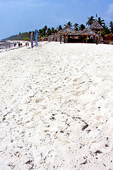 Image showing seaweed beach   in zanzibar house    sand isle  sky  and sailing