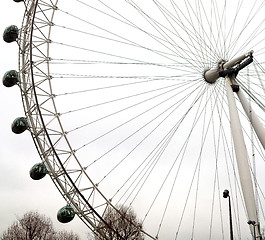 Image showing london eye in the spring sky and white clouds