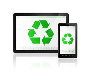 Image showing Digital tablet PC with a recycle symbol on screen. environmental