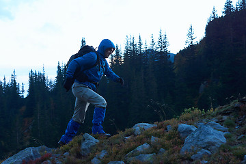 Image showing advanture man with backpack hiking