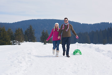 Image showing happy young couple having fun on fresh show on winter vacation