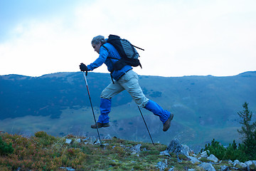 Image showing advanture man with backpack hiking