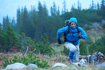 Image showing advanture man with backpack hiking