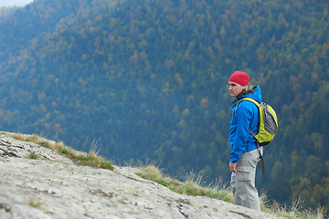 Image showing advanture man with backpack hiking