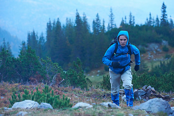 Image showing advanture man with backpack hiking