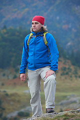 Image showing advanture man with backpack hiking