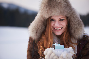 Image showing winter girl with gift