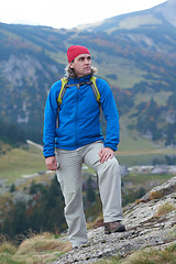 Image showing advanture man with backpack hiking