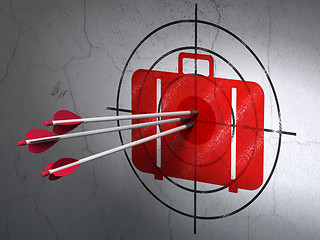 Image showing Travel concept: arrows in Bag target on wall background