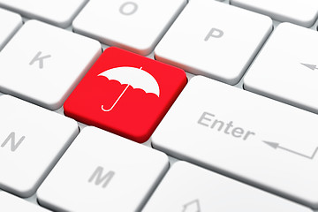 Image showing Privacy concept: Umbrella on computer keyboard background