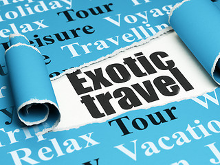 Image showing Vacation concept: black text Exotic Travel under the piece of  torn paper