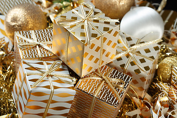 Image showing A pile of Christmas gifts