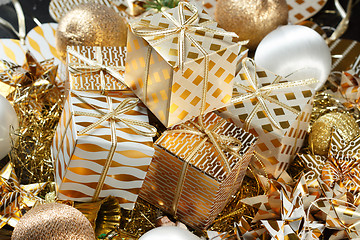 Image showing A pile of Christmas gifts