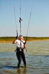 Image showing young woman kite-surfer