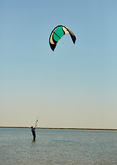 Image showing young woman kite-surfer