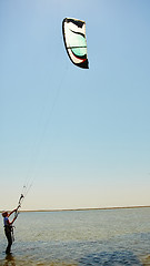 Image showing young woman kite-surfer