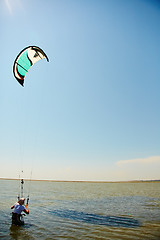 Image showing young woman kite-surfer