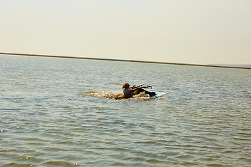 Image showing young woman kite-surfer