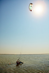 Image showing young woman kite-surfer