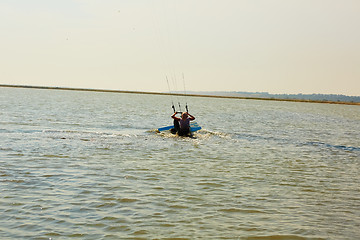 Image showing young woman kite-surfer