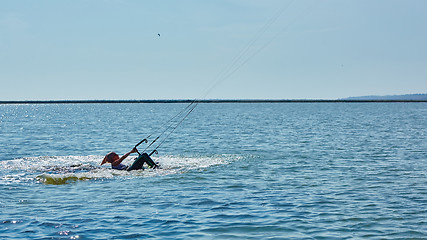 Image showing young woman kite-surfer