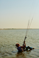 Image showing young woman kite-surfer