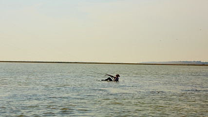 Image showing young woman kite-surfer