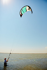 Image showing young woman kite-surfer