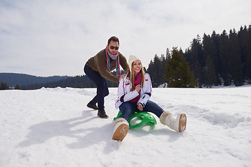 Image showing happy young couple having fun on fresh show on winter vacation