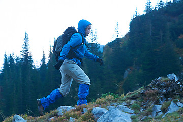 Image showing advanture man with backpack hiking