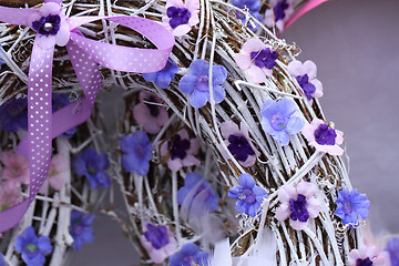Image showing spring violet plastic flowers decoration