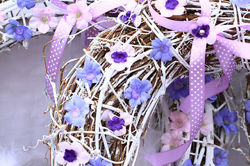 Image showing spring violet plastic flowers decoration