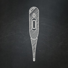 Image showing Health concept: Thermometer on chalkboard background