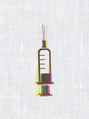 Image showing Medicine concept: Syringe on fabric texture background