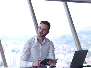 Image showing young business man at office