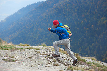 Image showing advanture man with backpack hiking