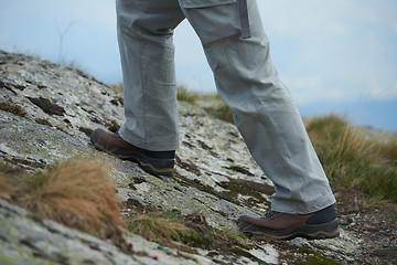 Image showing hiking man with trekking boots