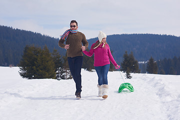 Image showing happy young couple having fun on fresh show on winter vacation