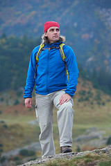 Image showing advanture man with backpack hiking